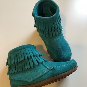 Turquoise child’s booties.